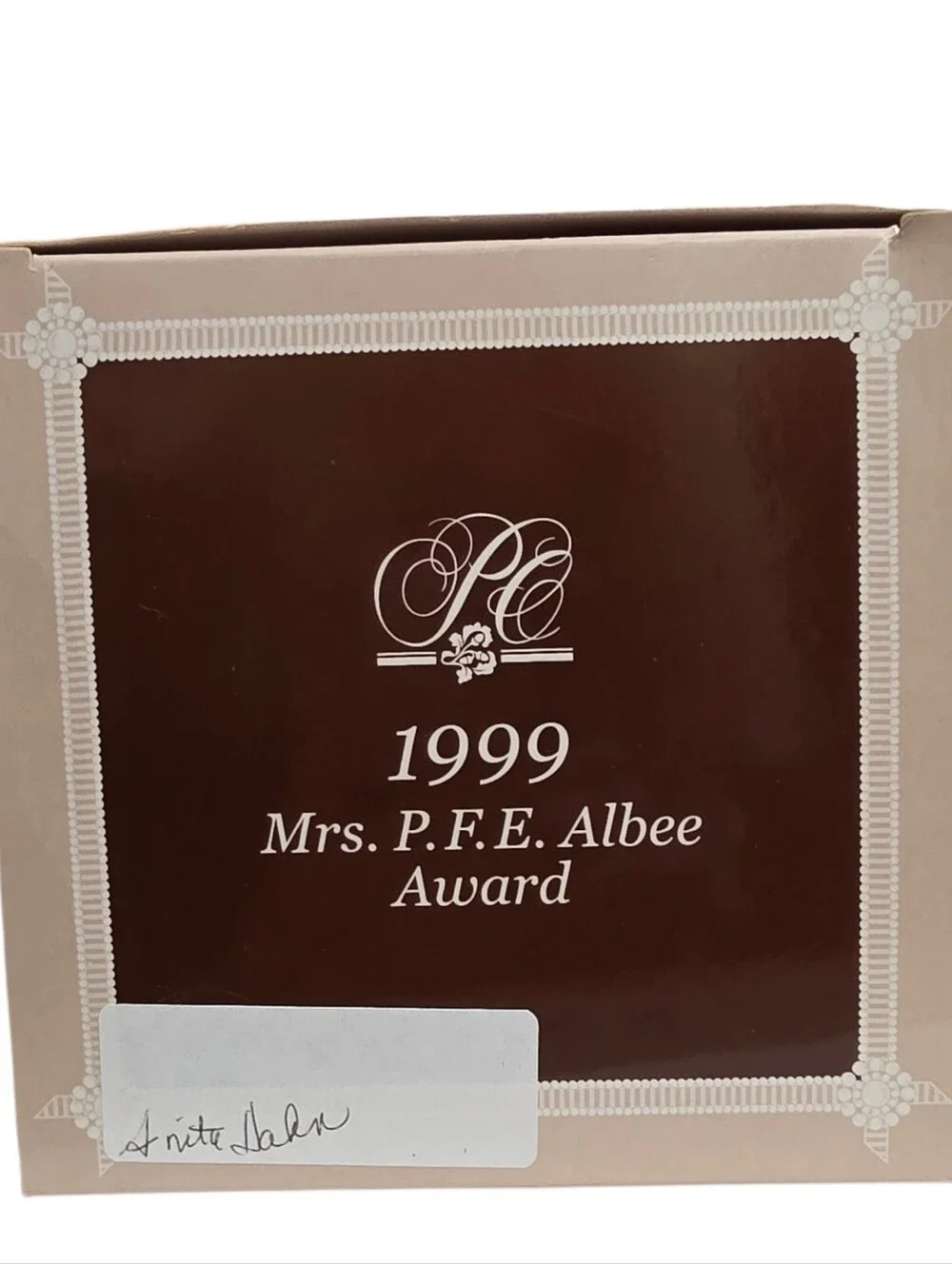 1999 Avon Mrs. P.F.E. Albee President's Club Award porcelain figurine.